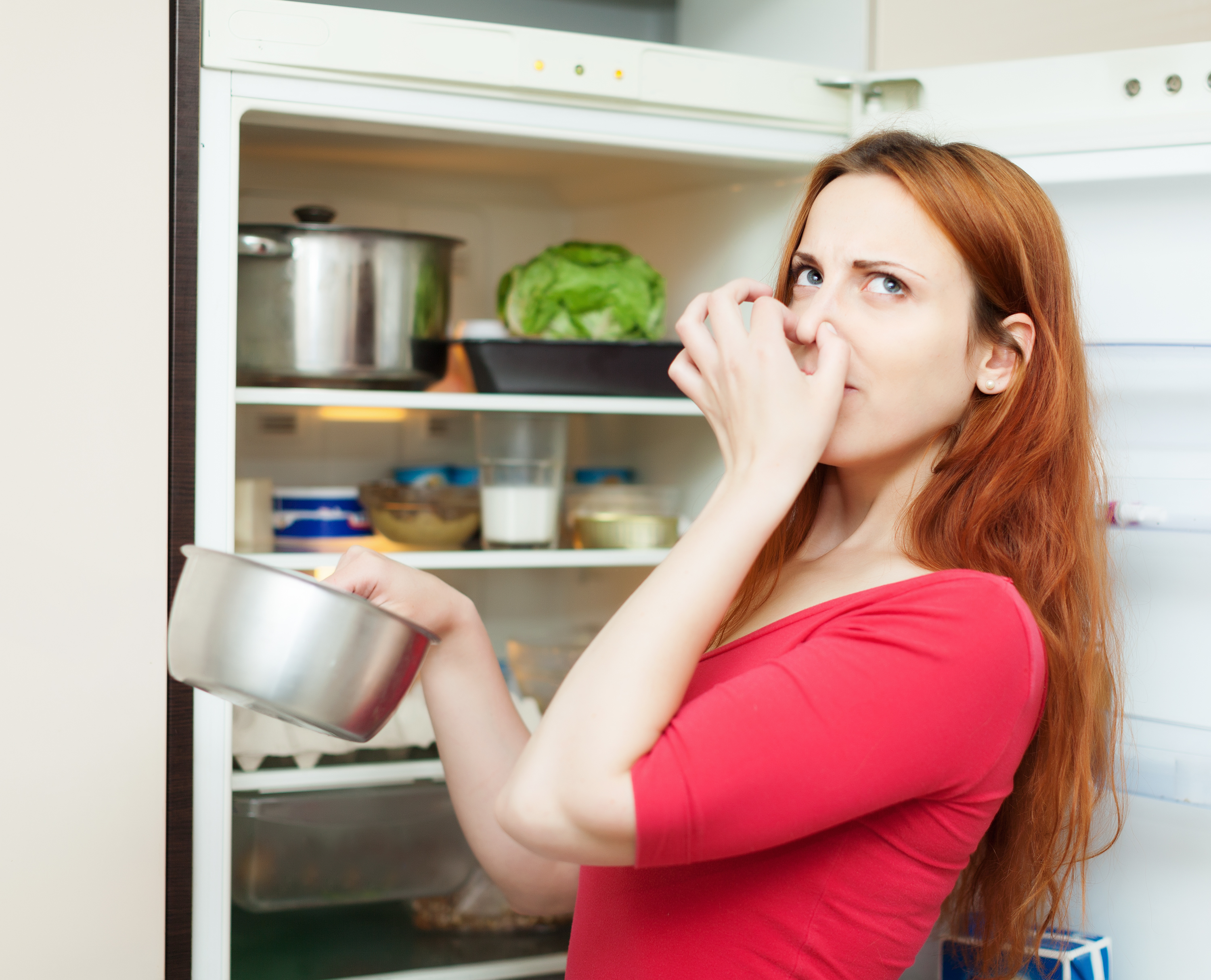 woman-red-holding-foul-food.jpg
